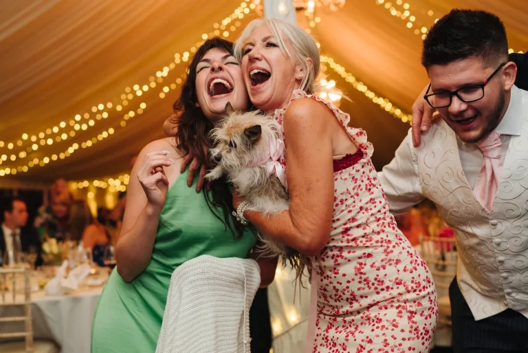 Wedding guests celebrating at a Norfolk reception