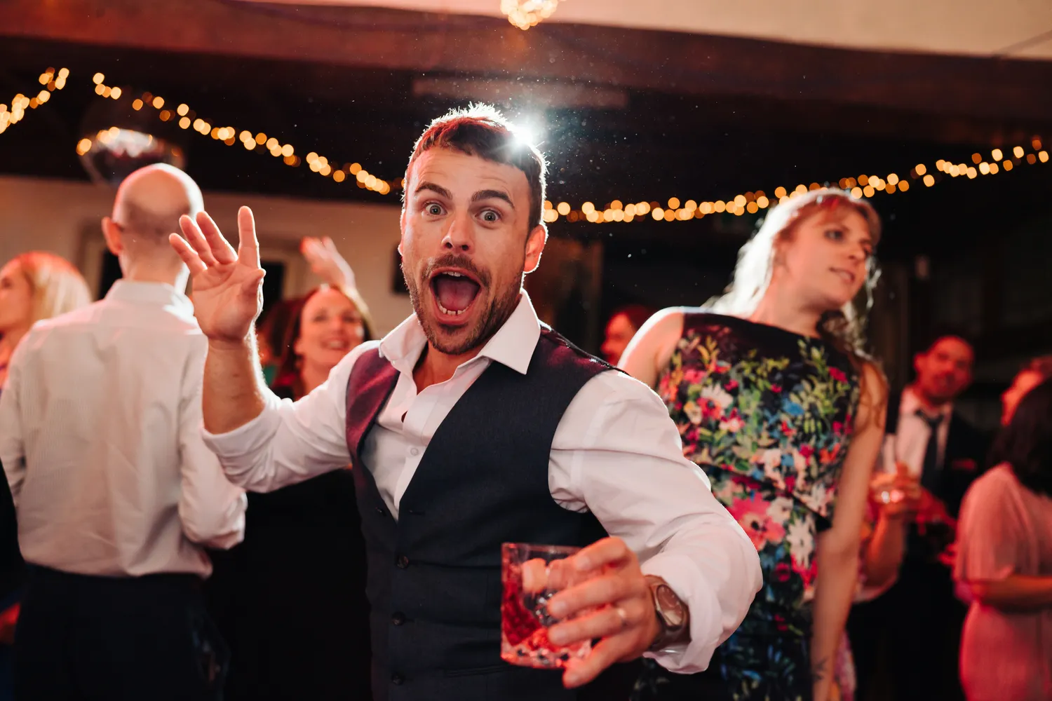 young man hitting the dance floor. Fantastic dancefloor wedding photos from Norwich